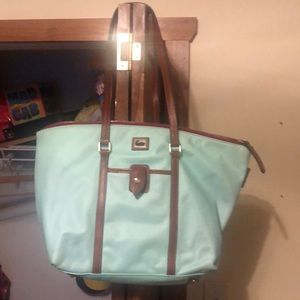 Gently used Dooney Bourke. Smoke free home. Small stain on bottom.